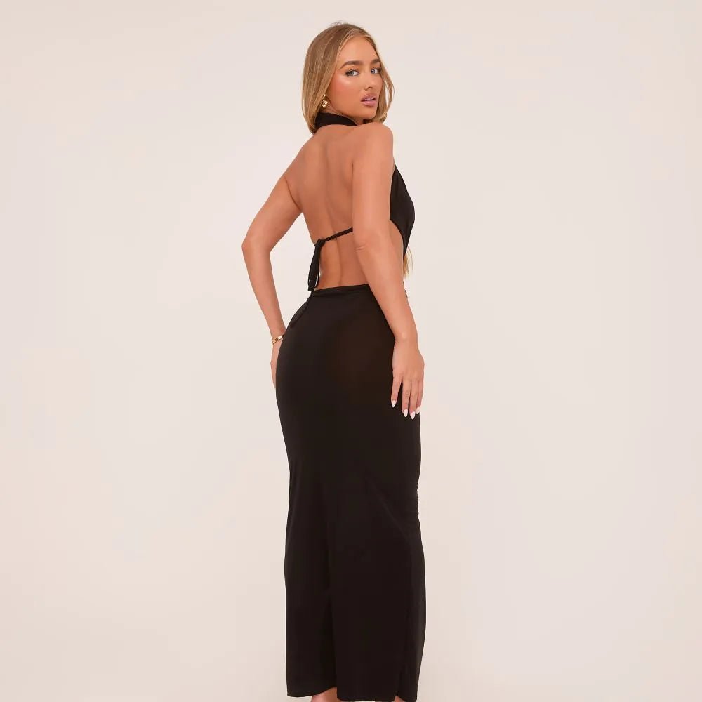 Vestido maxi slinky negro con escote profundo halter y detalle de nudo delantero - Rovella